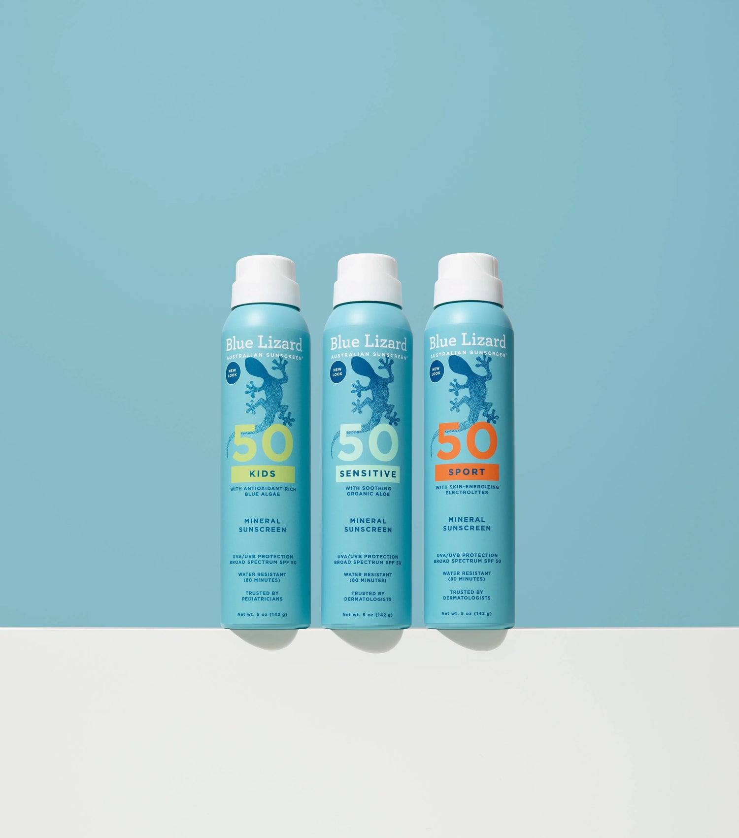 Blue Lizard mineral sunscreen sprays on a blue background