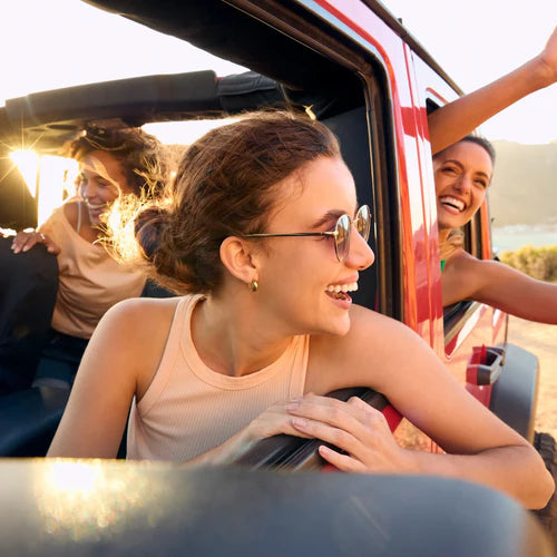 Women smiling in the car