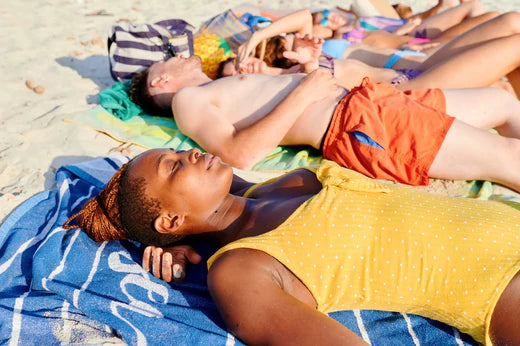 People tanning on the beach